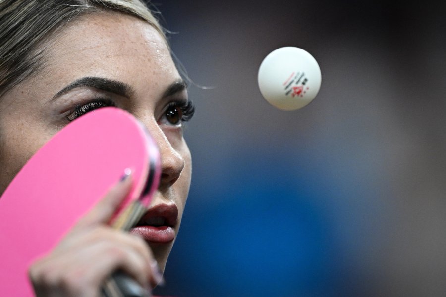 Romania's Bernadette Szocs plays a return to Ukraine's Margaryta Pesotska during their women's table tennis singles round of 32 at the Paris 2024 Olympic Games at the South Paris Arena in Paris on July 30, 2024. 