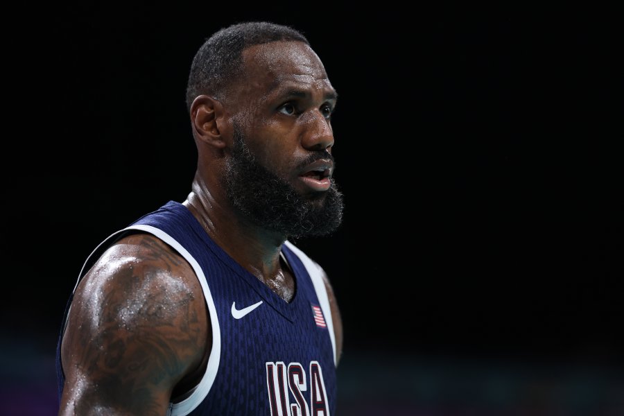 LeBron James #6 of Team United States looks on during the first half of the Men's Group Phase - Group C game