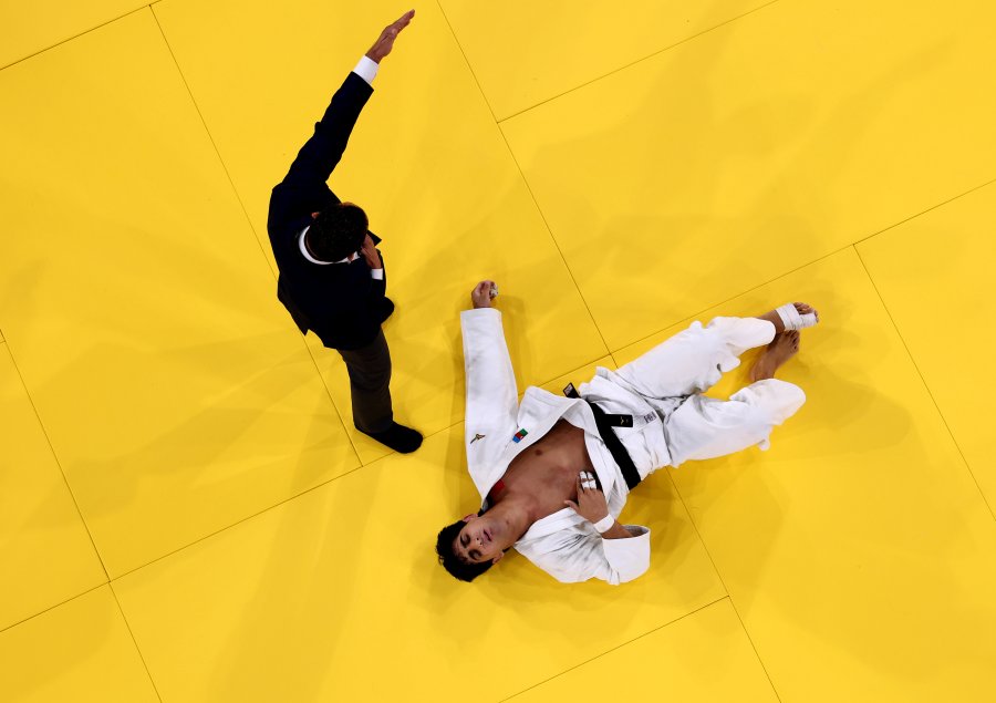 Balabay Aghayev of Team Azerbaijan reacts during the Men's -90kg Elimination Round of 16 match between Balabay Aghayev of Team Azerbaijan and Woojin Kim of Team Republic of Korea on day five of the Olympic Games Paris 2024 at Champs-de-Mars Arena on July 31, 2024 in Paris, France