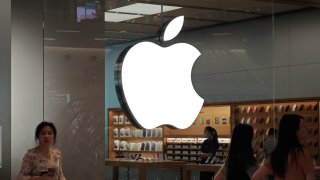 Customers are trying on and learning about Apple Vision Pro headsets at an Apple store in Shanghai, China, on July 22, 2024. 