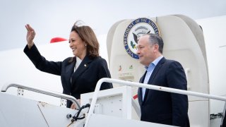 U.S. Vice President Kamala Harris and second gentleman Douglas Emhoff descend from Air Force Two in Wilmington, DE, U.S., July 22, 2024.