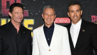 Hugh Jackman, Robert Iger, and Ryan Reynolds at the Marvel Studios’ “Deadpool & Wolverine” World Premiere held at David H. Koch Theater on July 22, 2024 in New York, New York. 