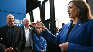 US Vice President and Democratic presidential candidate Kamala Harris speaks to reporters outside Primanti Bros. Restaurant and Bar during a bus campaign tour stop in Moon Township, Pennsylvania, on August 18, 2024.