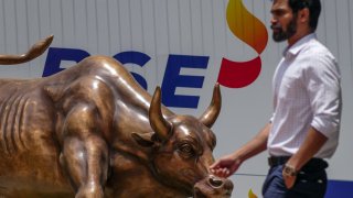 A bronze bull statue outside the Bombay Stock Exchange (BSE) building in Mumbai, India, on Monday, June 3, 2024. India’s stock futures jumped after exit polls indicated a resounding victory for Prime Minister Narendra Modi’s ruling party in general elections that concluded Saturday. Photographer: Dhiraj Singh/Bloomberg via Getty Images