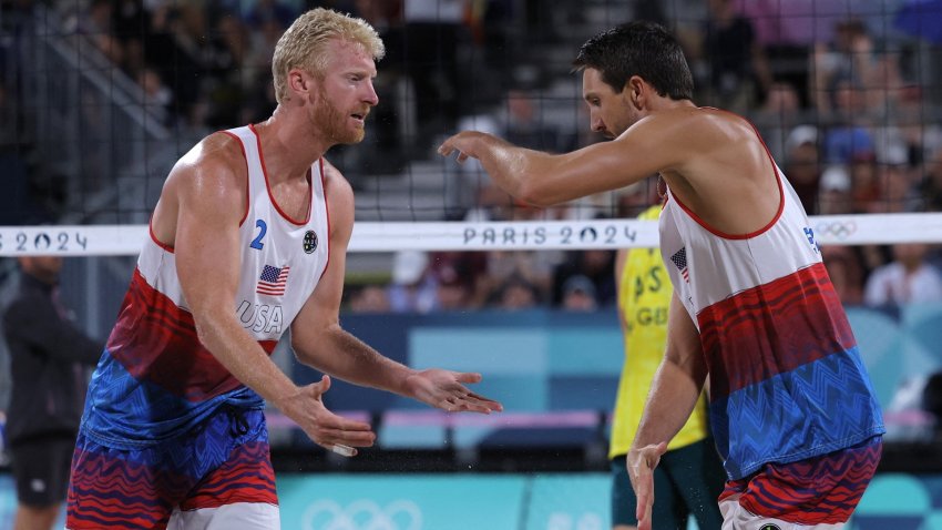 Miles Evans and Chase Budinger during a volleyball match.