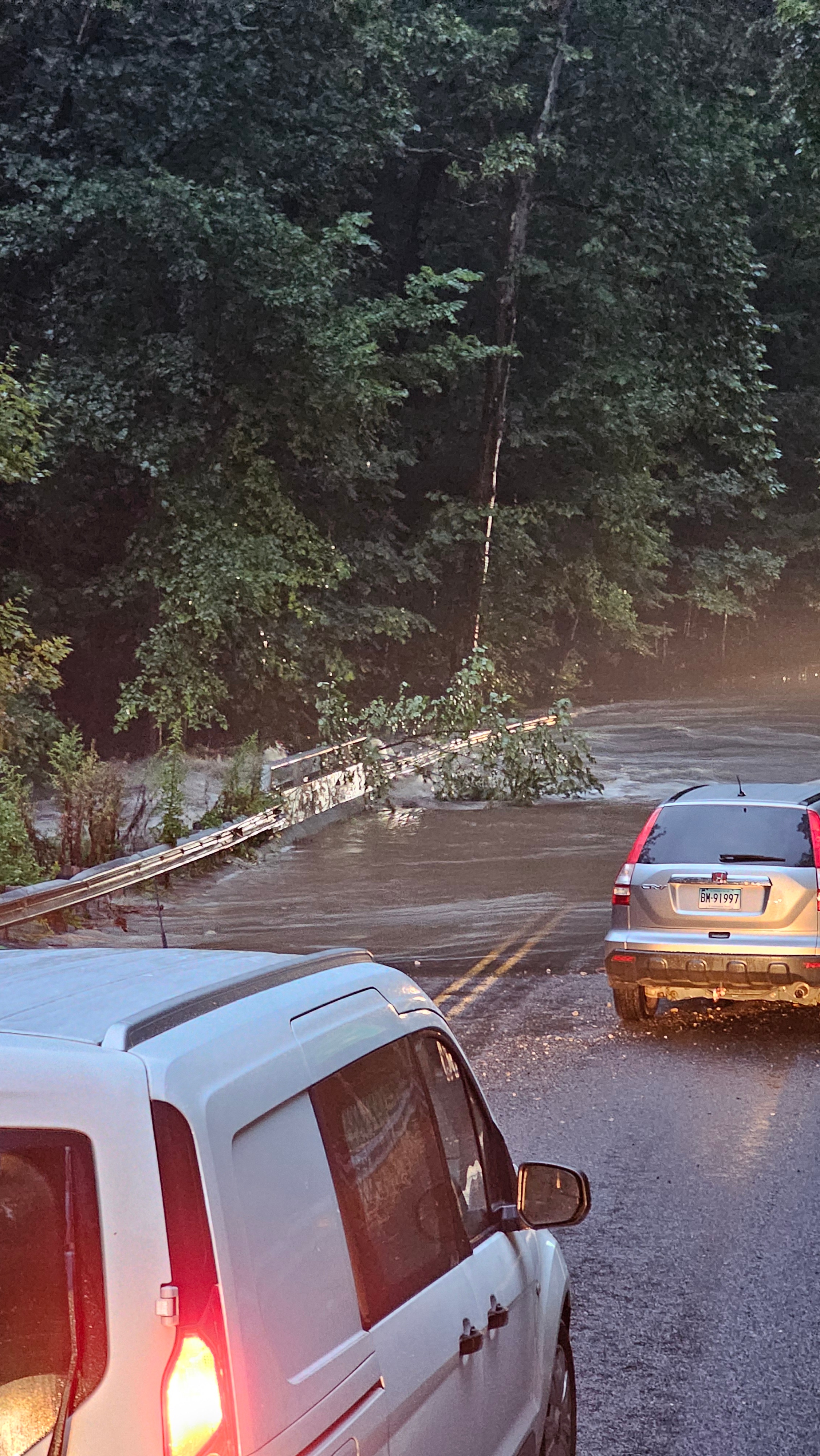 Bridge beneath Southford falls is completely washed out. A guy in a white truck “baja’ed” it over the Gao just before this picture and barely made it. He’s lucky to be alive!