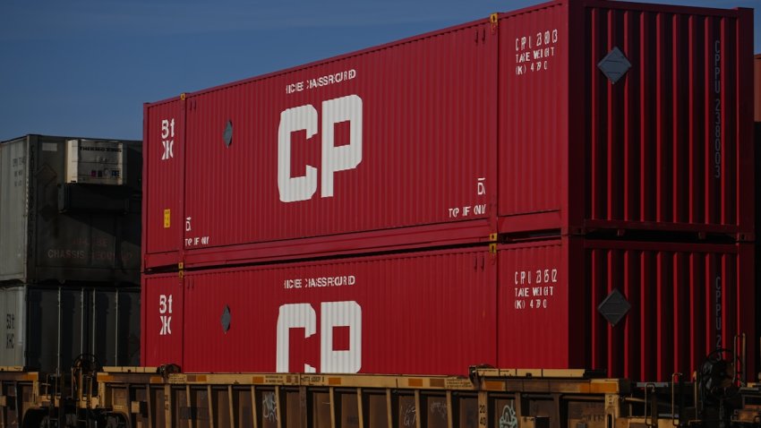 Rail transport of containers, including Canadian Pacific containers, awaiting on a siding in Edmonton, on April 17, 2024, in Edmonton, Alberta, Canada.