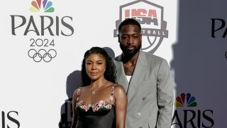 Gabrielle Union (L) and former basketball player Dwayne Wade