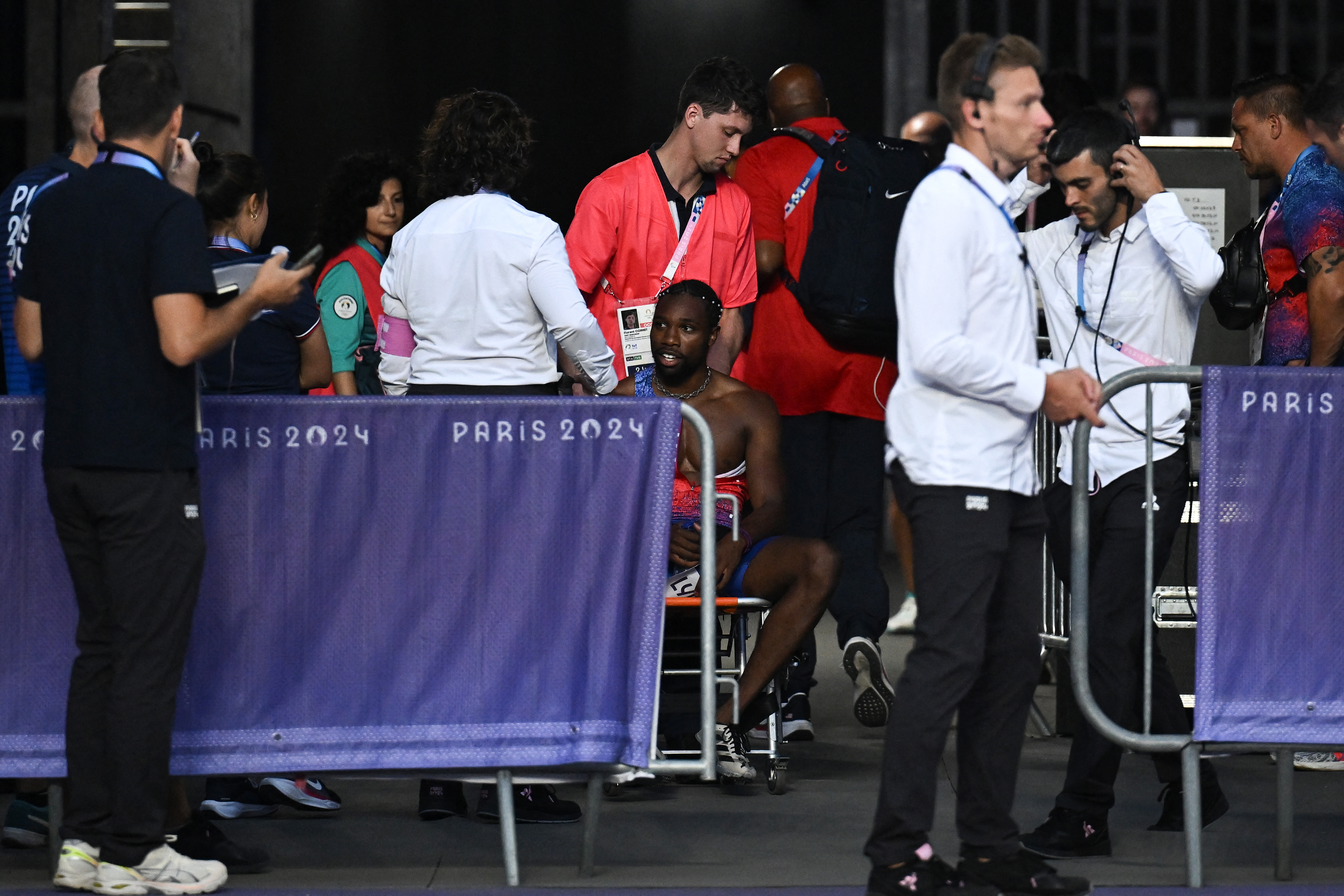 Noah Lyles diagnosed with COVID, leaves track in wheelchair NBC