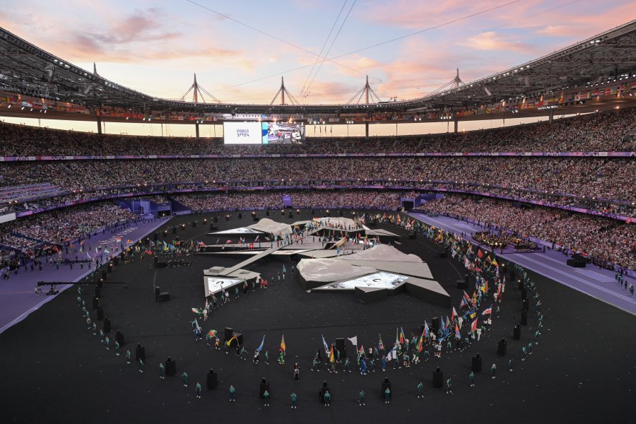 Delegations enter the stadium