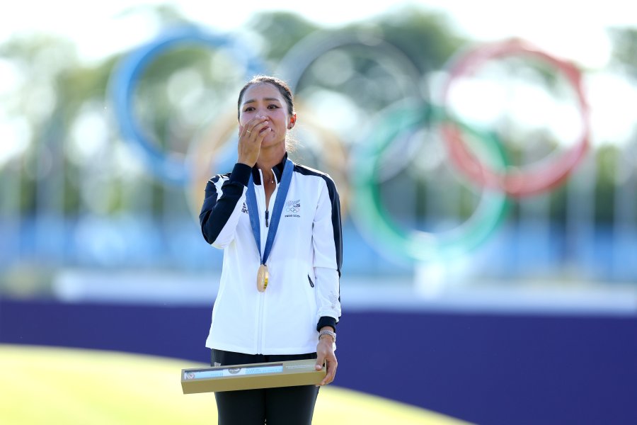 old medalist, Lydia Ko of Team New Zealand reacts