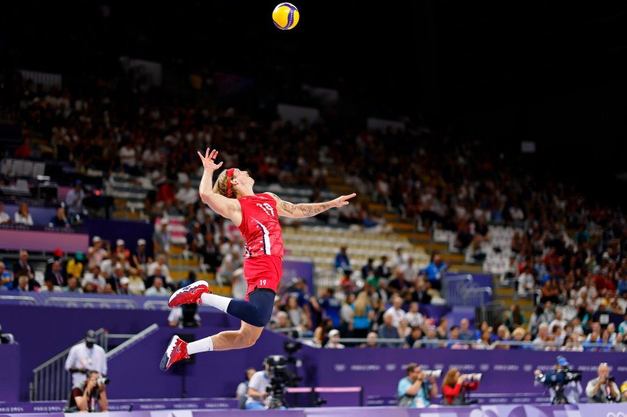 United States middle blocker Taylor Averill serves