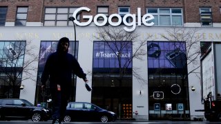 A pedestrian passes by the Google office in New York City on Jan. 25, 2023.