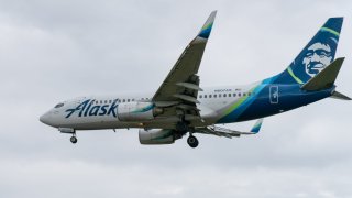 Boeing 737-790 aircraft belonging to Alaska Airlines is seen flying at Anchorage Ted Stevens International Airport in Anchorage, Alaska, United States on July 2, 2024. 