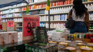 People shop at a store in Brooklyn on August 14, 2024 in New York City. 