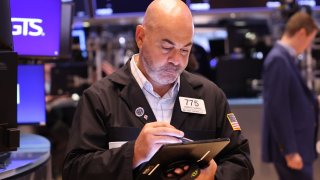 Traders work on the floor of the New York Stock Exchange during morning trading on September 04, 2024 in New York City. 