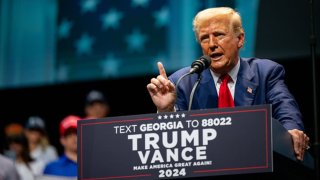 Republican presidential nominee, former U.S. President Donald Trump speaks at a campaign rally at the Johnny Mercer Theatre in Savannah, Georgia on September 24, 2024. 