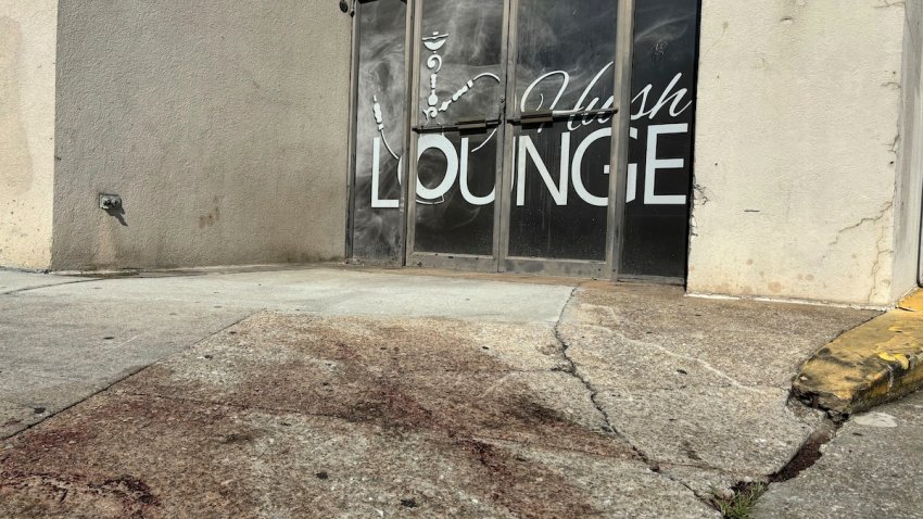 Blood stains were visible on the sidewalk outside of a nightclub in Birmingham, Ala. on Sunday, Sept. 22, 2024, after a mass shooting took place. (AP Photo/Kim Chandler)