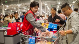 Customers shop at the new store of Costco on May 28, 2024 in Nanjing, Jiangsu Province of China.