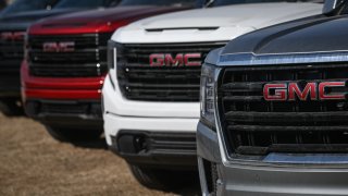 GMC trucks parked outside a GMC dealership, on April 3, 2024, in Sherwood Park, Strathcona County, Alberta, Canada. 