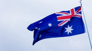 The Australian flag is in front of Christiansborg Palace in Copenhagen, Denmark, on January 14, 2024. 