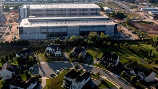 An Amazon Web Services data center in Stone Ridge, Virginia, US, on Sunday, July 28, 2024. Data center developers in Northern Virginia are asking utility Dominion Energy Inc. for as much power as several nuclear reactors can generate, in the latest sign of how artificial intelligence is helping drive up electricity demand.