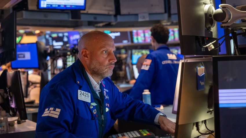 Traders work on the floor of the New York Stock Exchange (NYSE) on October 22, 2024 in New York City.