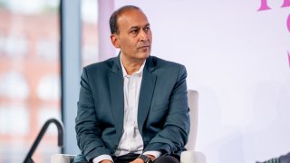 Poshmark CEO Manish Chandra speaks at the ‘Building for the 21st Century Economy’ panel during the The Juggernaut Summit 2023.