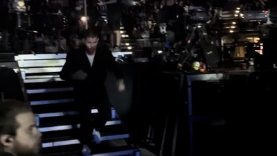 Nick Jonas runs off stage after red light pointed at his head