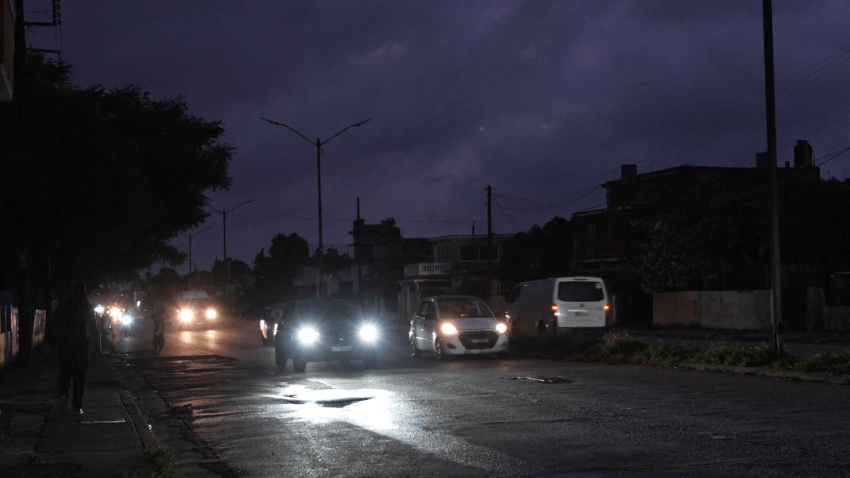 Cars driving on dark road