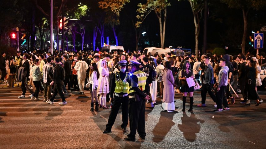 Citizens and tourists dress up and take part in a Halloween parade in Shanghai, China, October 31, 2023.