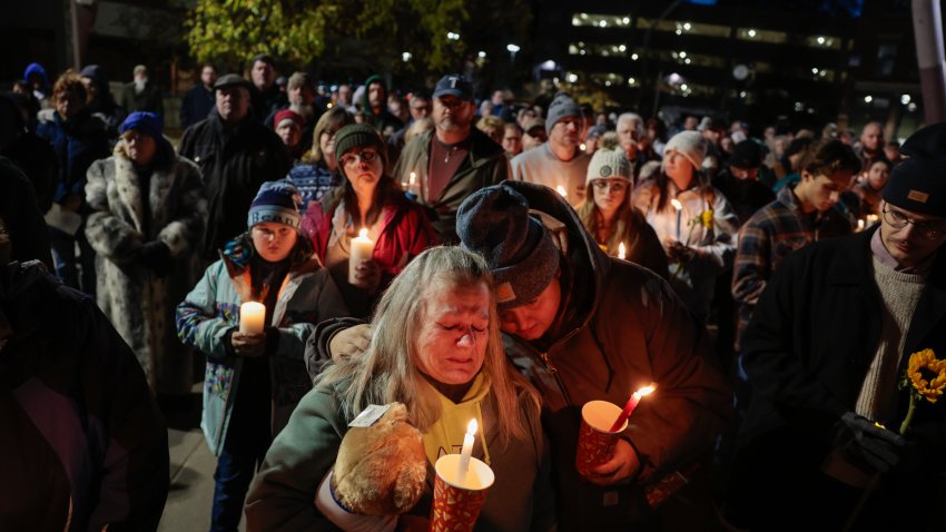 The crowd gathers during a candlelight vigil, honoring the victims of the Lewiston shootings.