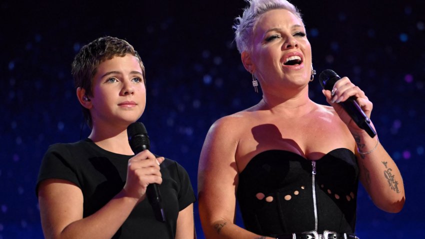 TOPSHOT – US singer-songwriter Pink (R) and her daughter Willow (L) perform on the fourth and last day of the Democratic National Convention (DNC) at the United Center in Chicago, Illinois, on August 22, 2024. Vice President Kamala Harris will formally accept the party’s nomination for president today at the DNC which ran from August 19-22 in Chicago.