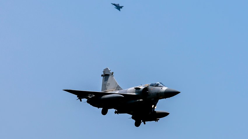 Two Taiwanese Air Force Mirage 2000 fighter jets armed with missiles are being deployed from the Hsinchu Air Base, following China’s announcement of the military exercise Joint Sword-2024B that encircles Taiwan, in Hsinchu, Taiwan on October 14, 2024.