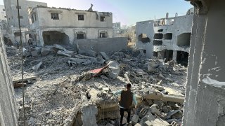 A Palestinian inspects the damage after an overnight Israeli airstrike in Beit Lahia the northern Gaza Strip on October 27, 2024 amid the ongoing war in the Palestinian territory between Israel and Hamas.