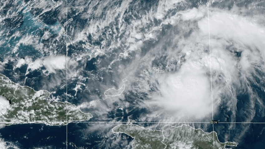 “Tiny” Oscar intensified into a hurricane Saturday, the National Hurricane Center said, with maximum sustained winds of 80 mph.