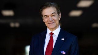 Dr. Mehmet Oz, a former celebrity TV host and Republican U.S. Senate candidate in Pennsylvania, poses for a portrait outside a polling location during the primary election in Rockledge, Pennsylvania, May 17, 2022.