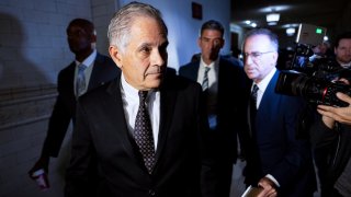 Larry Krasner, Philadelphia’s district attorney, center, departs after a hearing at City Hall in Philadelphia, Pennsylvania, US, on Thursday, Oct. 31, 2024. 