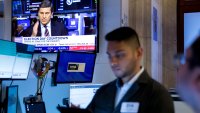 Traders work on the floor of the New York Stock Exchange. 