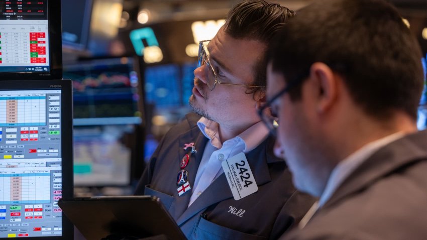 Traders work on the New York Stock Exchange (NYSE) floor on November 12, 2024 in New York City.