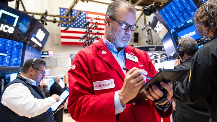 Traders work on the New York Stock Exchange floor on November 12, 2024 in New York City.