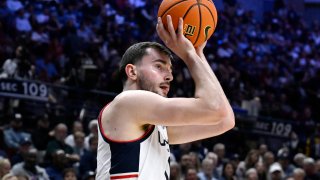 UConn forward Alex Karaban lines up a three-point basket in the first half of an NCAA college basketball game against Sacred Heart, Wednesday, Nov. 6, 2024, in Storrs, Conn.