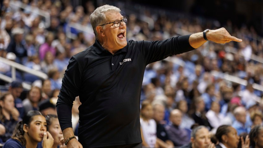 UConn head coach Geno Auriemma directs his team during the first half of an NCAA college basketball game against North Carolina in Greensboro, N.C., Friday, Nov. 15, 2024.