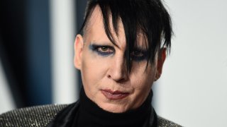 FILE – Marilyn Manson arrives at the Vanity Fair Oscar Party, Feb. 9, 2020, in Beverly Hills, Calif.