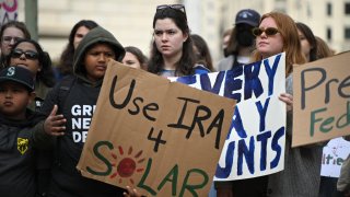 Environmental activists rally.