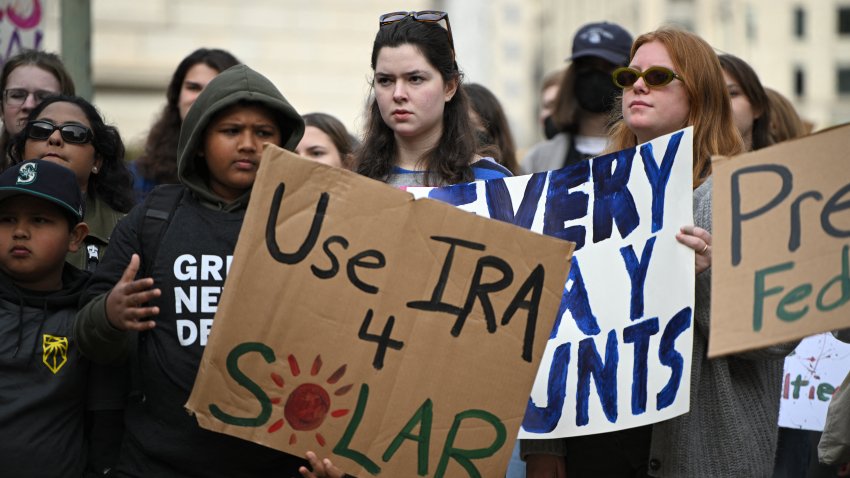 Environmental activists rally.