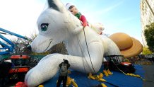 The Extraordinary Noorah & The Elf on the Shelf by the Lumistella Company balloon is prepared during the Macy's Parade Balloon Inflation November 27, 2024. The annual Macy's Thanksgiving Day Parade in New York City started in 1924. The annual Macy's Thanksgiving Day Parade in New York City started in 1924. (Photo by TIMOTHY A. CLARY / AFP) (Photo by TIMOTHY A. CLARY/AFP via Getty Images)