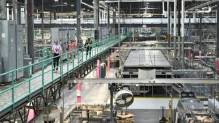 Guests take a factory tour during AriZona Iced Tea’s “AriZonaLand” Grand Opening on September 19, 2024 in Edison, New Jersey. 