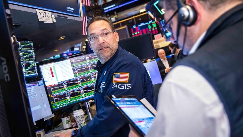 Traders work at the New York Stock Exchange on Dec. 17, 2024.