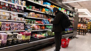 A person shops at a Whole Foods Market grocery store on December 17, 2024 in New York City. 